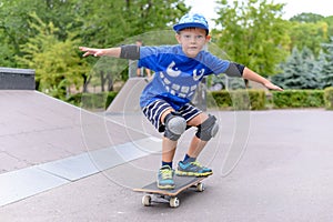 Young boy showing off on his skateboard