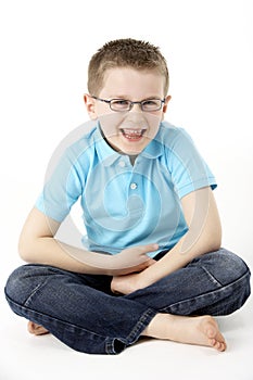 Young Boy Sitting In Studio