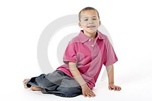 Young Boy Sitting In Studio