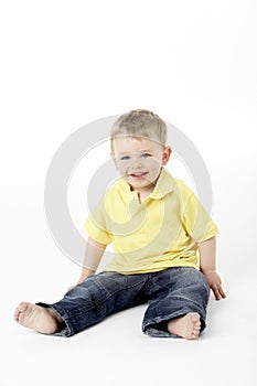 Young Boy Sitting In Studio