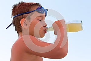 Young Boy Slaking his Thirst