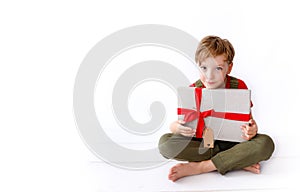 Young Boy Smiles with his Christmas Present