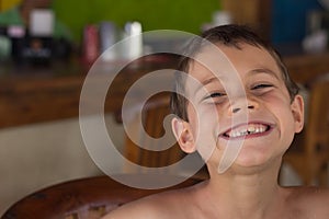 Young Boy Smiling a Big Grin photo