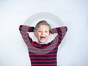 Young boy smiling with his front tooth missing