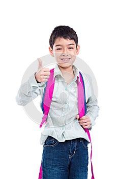 Young boy smiling and showing thumb up over white