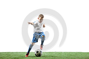 Young boy with soccer ball isolated on white. football player