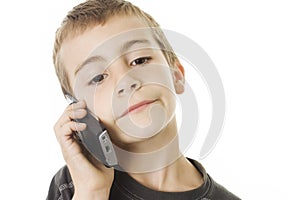 Young boy speaking on cellphone