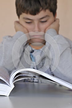 Young boy studying