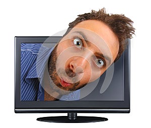 Young boy with a surprised expression in the tv