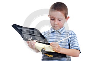 Young Boy Taking Notes