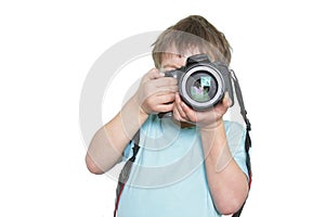 Young boy taking picture