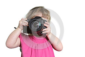 Young boy taking picture