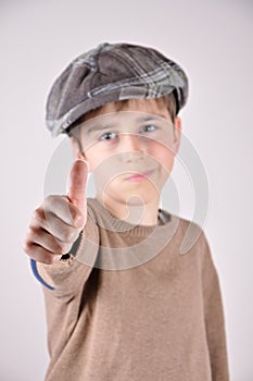 Young boy with a thumb up