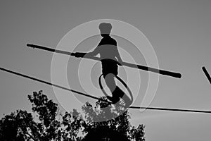 Young Boy Tightrope walking, Slacklining, Funambulism, Rope Balancing