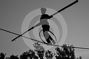 Young Boy Tightrope walking, Slacklining, Funambulism, Rope Balancing