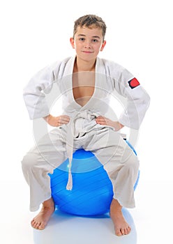 Young boy training karate.
