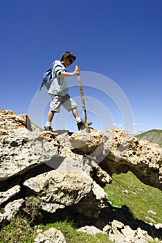 Young Boy Trekking in the French Alps with copy space