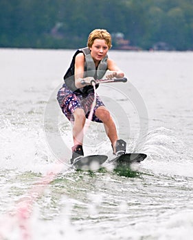 Young Boy on Trick Skis Smiling