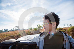 Young boy on truck and smiles