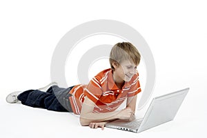 Young Boy Using Laptop Computer