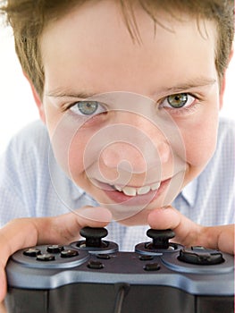 Young boy using videogame