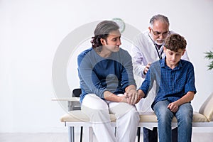 Young boy visiting doctor in hospital