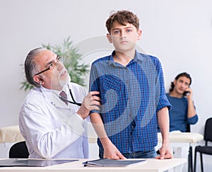 Young boy visiting doctor in hospital