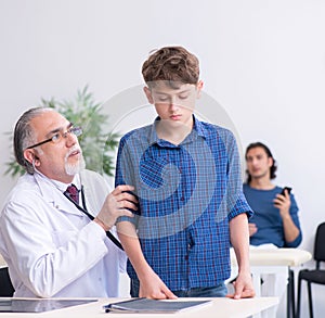 Young boy visiting doctor in hospital