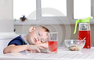 Young boy waiting patiently for his lunch