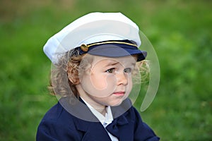 Young boy Wearing Navy Sailor Hat