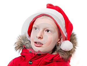 Young boy wearing santa hat