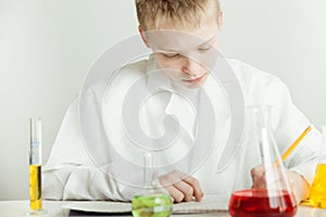 Young boy working in a chemistry laboratory