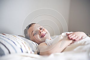 Young Boy Sleeping In Bed