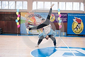 young boys cheerleaders perform at the city cheerleading championship