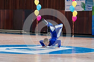 Young boys cheerleaders perform at the city cheerleading championship