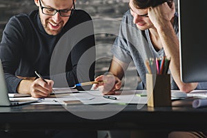 Young boys doing paperwork