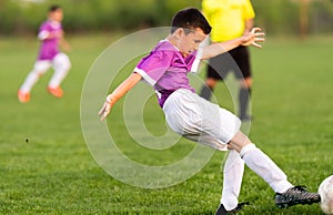 Young boys playing soccer