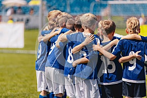 Young Boys of Sports Soccer Club Team Standing Together United. Kids Listening Coach Pre Match Speech