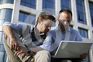 Young boys working on laptop