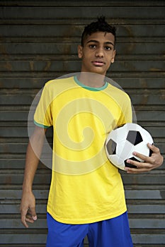 Young Brazilian Football Player Holding Soccer Ball