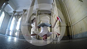 Young breakdancer dancing on the street in Karlovy vary.