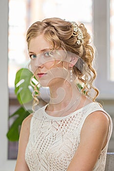 Young bride with beauty wedding hairstyle