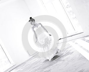 Young bride on the empty room dance