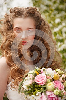 Young bride with flowers