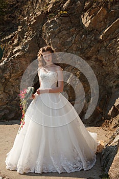 Young bride with flowers