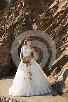 Young bride with flowers