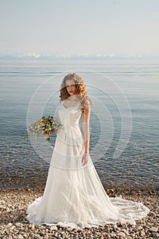 Young bride with flowers