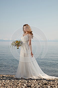 Young bride with flowers