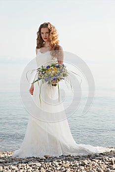 Young bride with flowers