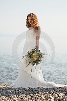 Young bride with flowers